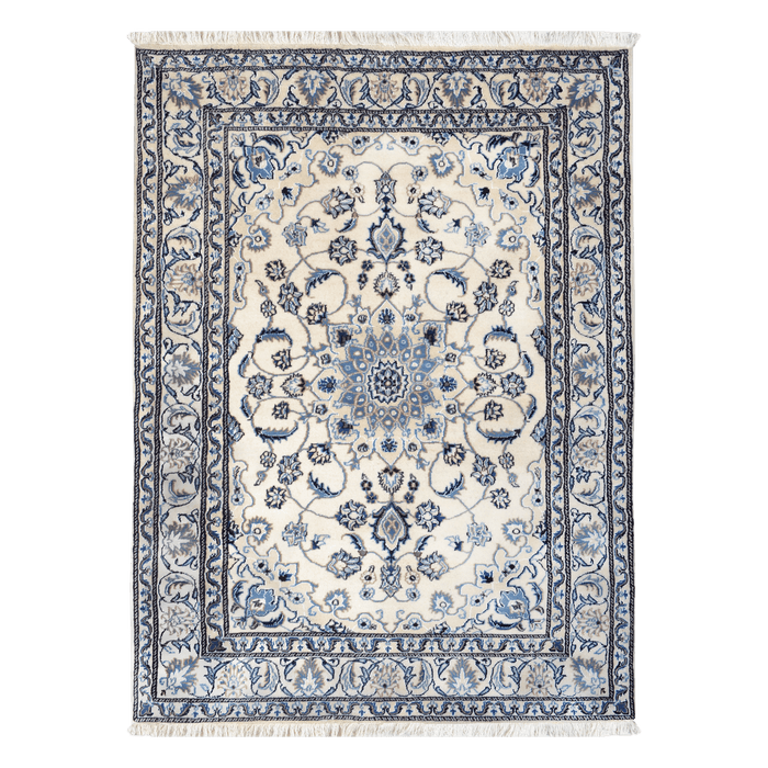 Cam Rugs: A cream base handmade Nain wool area rug, with accented blue details of floral motif designs.