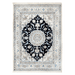 A cream and black handmade Nain wool area rug, with a traditional floral motif design. 