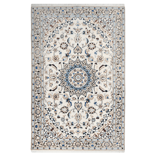 A cream handmade Nain wool area rug, with a traditional floral motif design. 