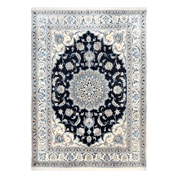 A cream and blue handmade Nain wool area rug, with a floral motif design. 
