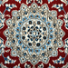 Cam Rugs: The center medallion of a cream base handmade Nain wool area rug, with accented red details of floral motif designs. 