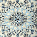 Cam Rugs: The center medallion of a cream base handmade Nain wool area rug, with details of floral motif designs.