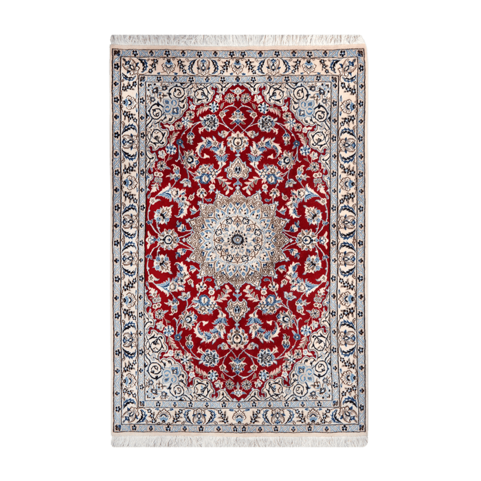 A cream and red handmade Nain wool area rug, with a floral motif design. 