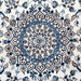 Cam Rugs: The center of a cream Nain wool area rug, with a traditional floral motif design.
