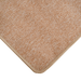Cam Rugs: A close-up corner of a beige sample area rug.