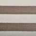 Cam Rugs: A close-up detail of a cream and beige sample area rug, with striped pattern.