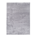 A solid grey shag area rug.