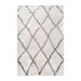 A cream shag area rug, with diamond geometric designs.