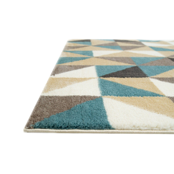 A corner of a multi-coloured area rug with geometric designs.