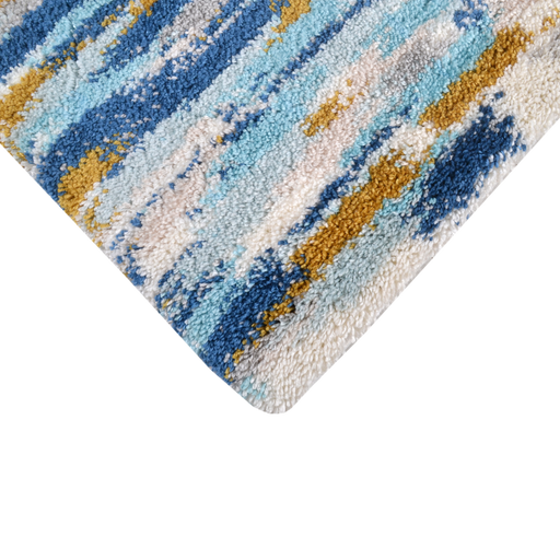 Corner of a CamRugs.Ca blue abstract shag area rug.