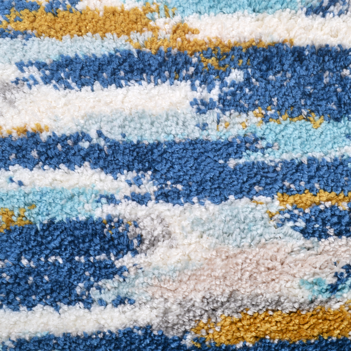 Detail of a CamRugs.Ca blue abstract shag area rug.