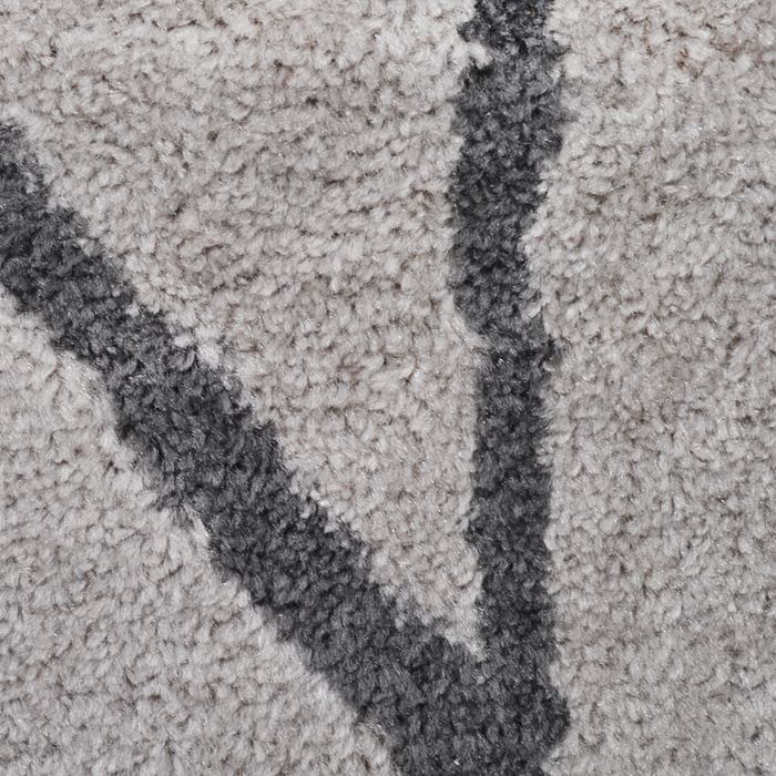 Detail of a CamRugs.Ca grey geometric area rug.