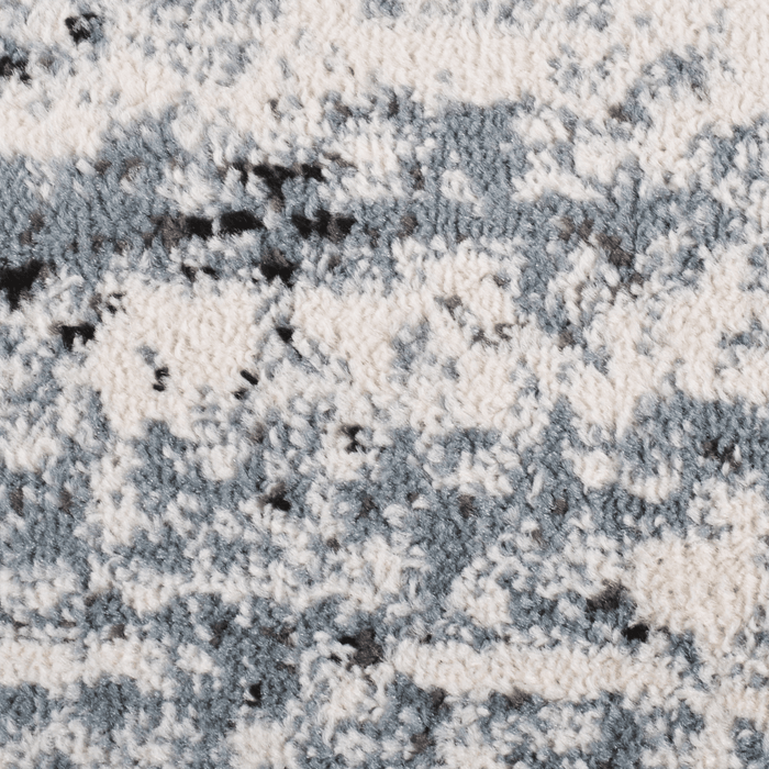 Detail of a CamRugs.Ca blue traditional area rug.