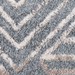 Detail of a CamRugs.Ca blue geometric area rug.