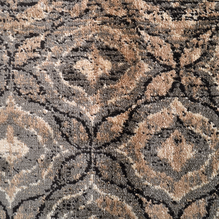 Detail of a CamRugs.Ca brown distressed traditional area rug.