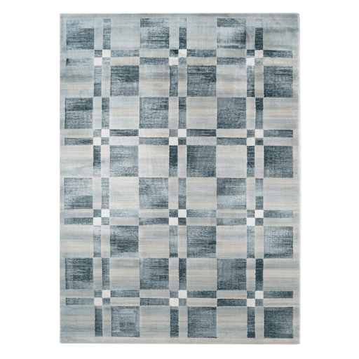A blue and cream area rug with geometric designs.