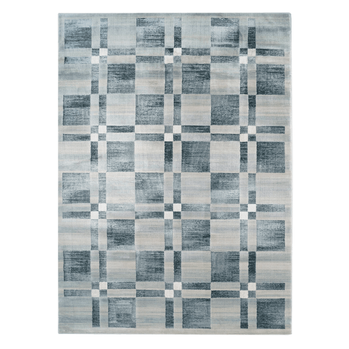 A blue and cream area rug with geometric designs.