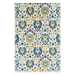 A cream area rug, with blue, green, and yellow floral damask designs.