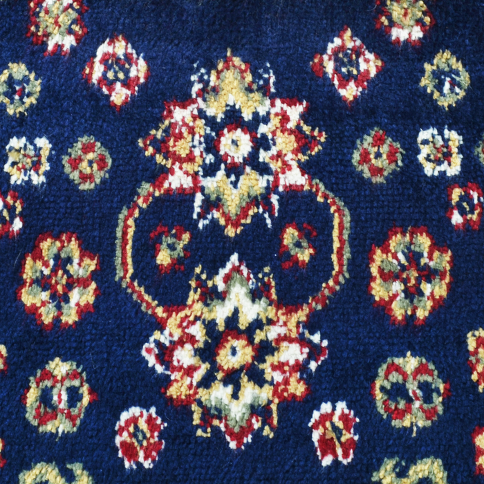 Detail of a CamRugs.Ca blue traditional washable runner.