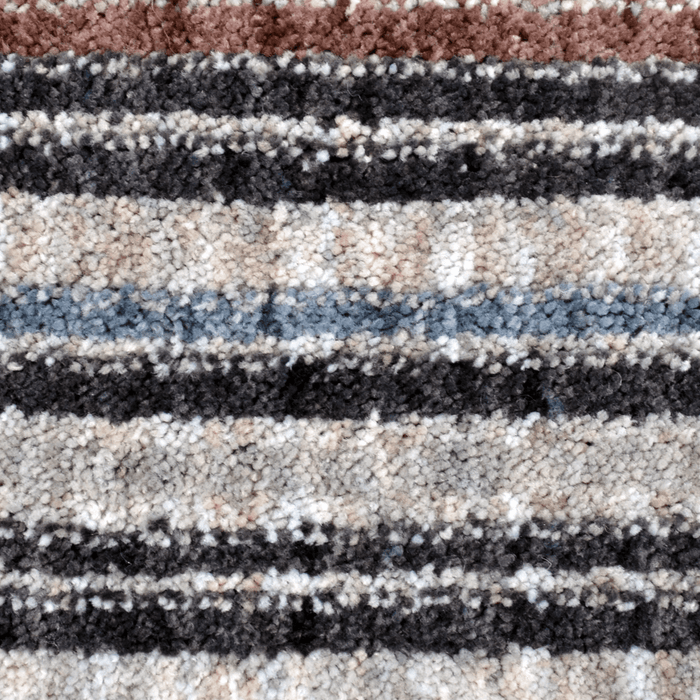 Detail of a CamRugs.Ca ivory modern area rug, made from recycled materials.