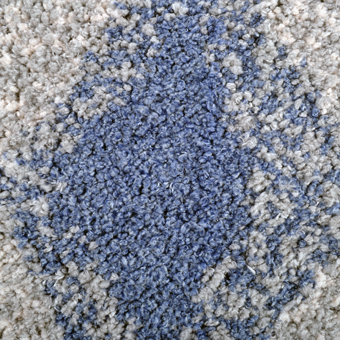 Detail of a CamRugs.Ca blue modern geometric shag area rug.