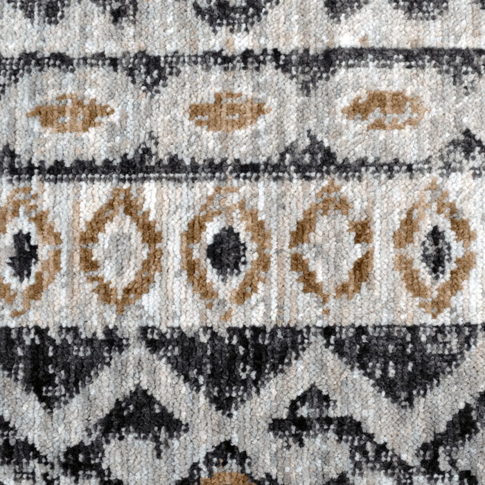 Detail of a CamRugs.Ca grey geometric area rug, made from recycled materials.