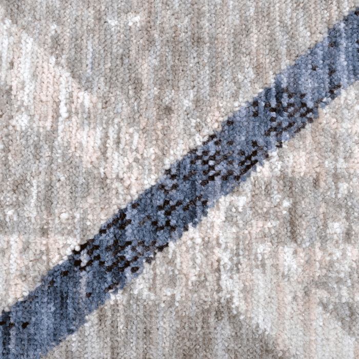 Detail of a CamRugs.Ca grey modern geometric area rug, made from recycled materials.