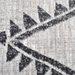 Detail of a CamRugs.Ca grey geometric area rug, made from recycled materials.