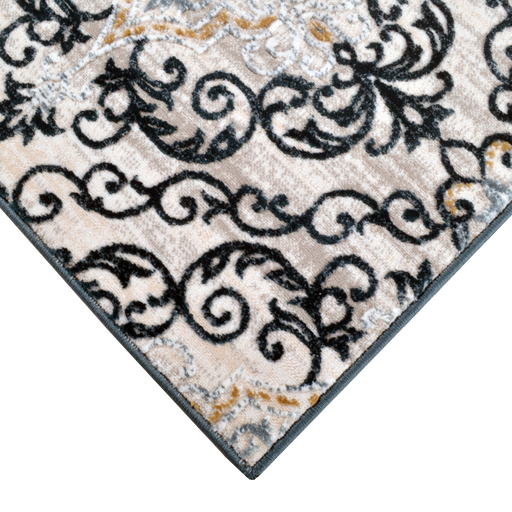 Corner of a CamRugs.Ca cream and blue geometric traditional area rug.