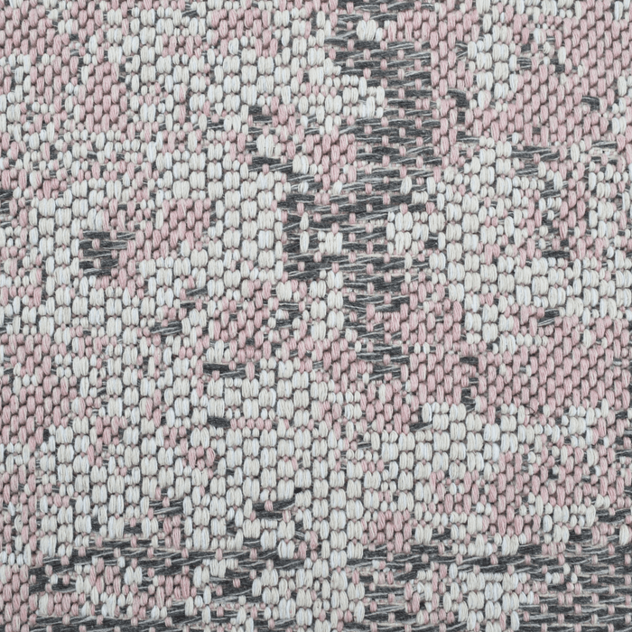 Detail of a CamRugs.Ca pink distressed abstract area rug.