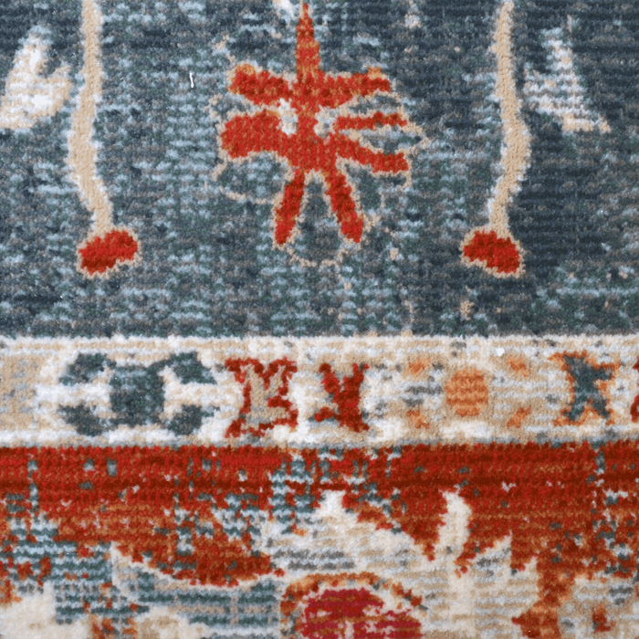Detail of a CamRugs.Ca multi-colour distressed traditional area rug.