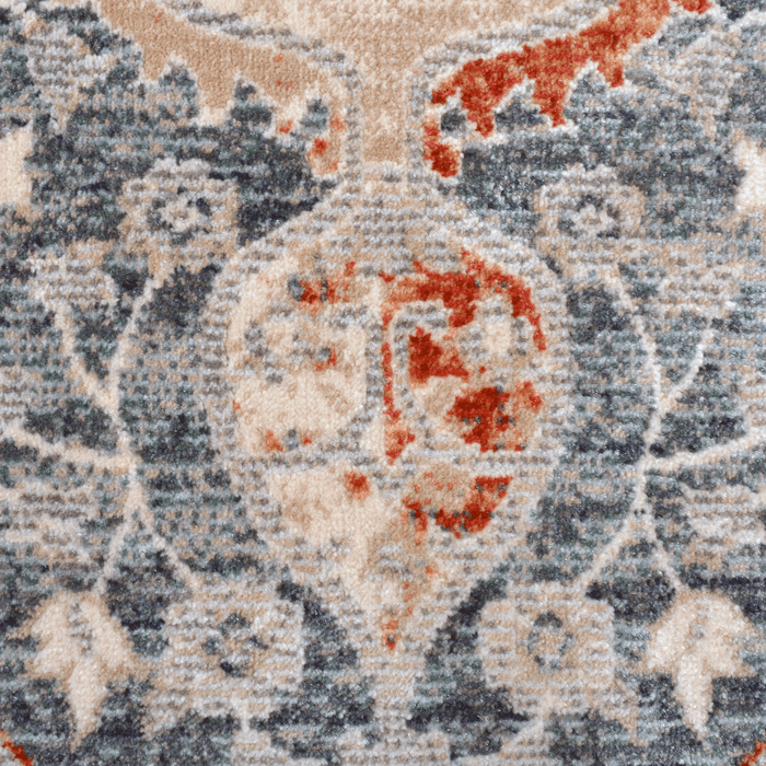 Detail of a CamRugs.Ca multi-colour distressed traditional area rug.