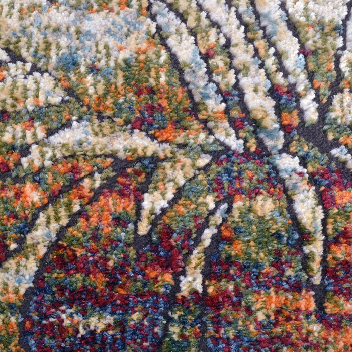 Detail of a CamRugs.Ca multi-colour distressed floral area rug.