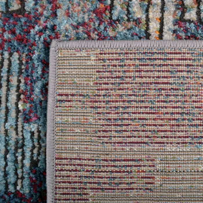 Back of a CamRugs.Ca multi-colour distressed abstract area rug.