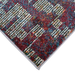 Corner of a CamRugs.Ca multi-colour distressed abstract area rug.