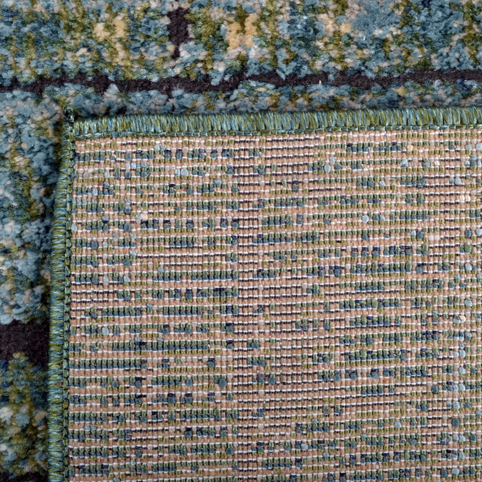 Back of a CamRugs.Ca green distressed abstract area rug.