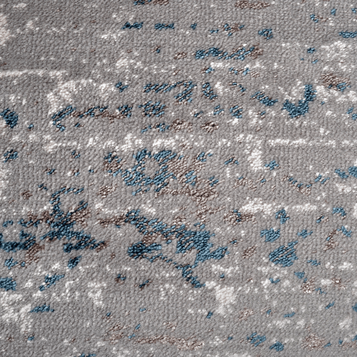 Detail of a CamRugs.Ca grey distressed area rug.
