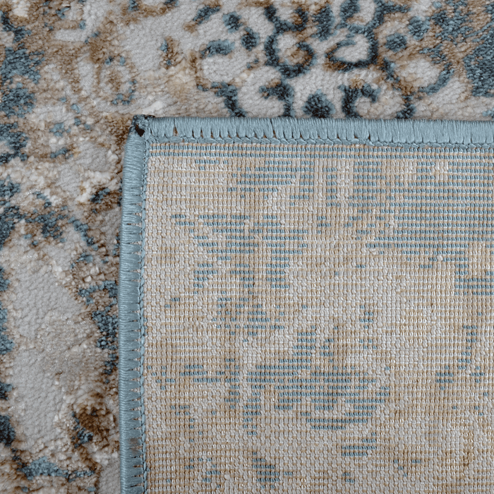 Back of a CamRugs.Ca grey distressed traditional area rug.