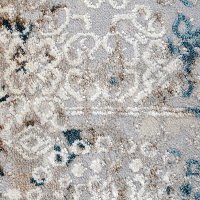 Detail of a CamRugs.Ca grey distressed traditional area rug.
