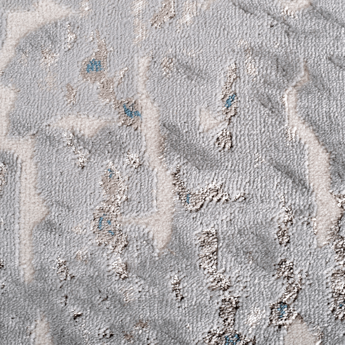 Detail of a CamRugs grey abstract area rug.
