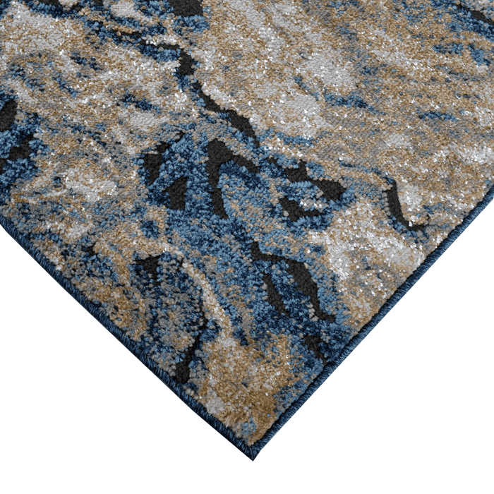 Corner of a CamRugs blue marble area rug.