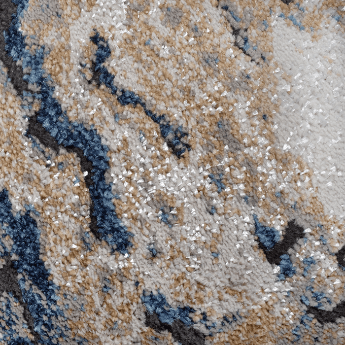 Detail of a CamRugs blue marble area rug.
