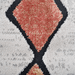Detail of a CamRugs multi-colour geometric area rug.