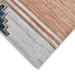 Corner of a CamRugs multi-colour geometric area rug.