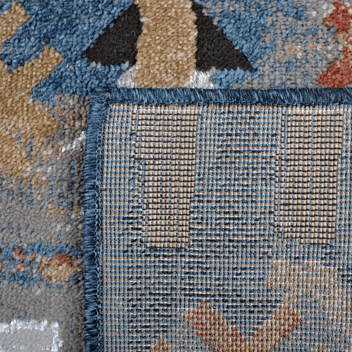 Back of a CamRugs blue geometric area rug.