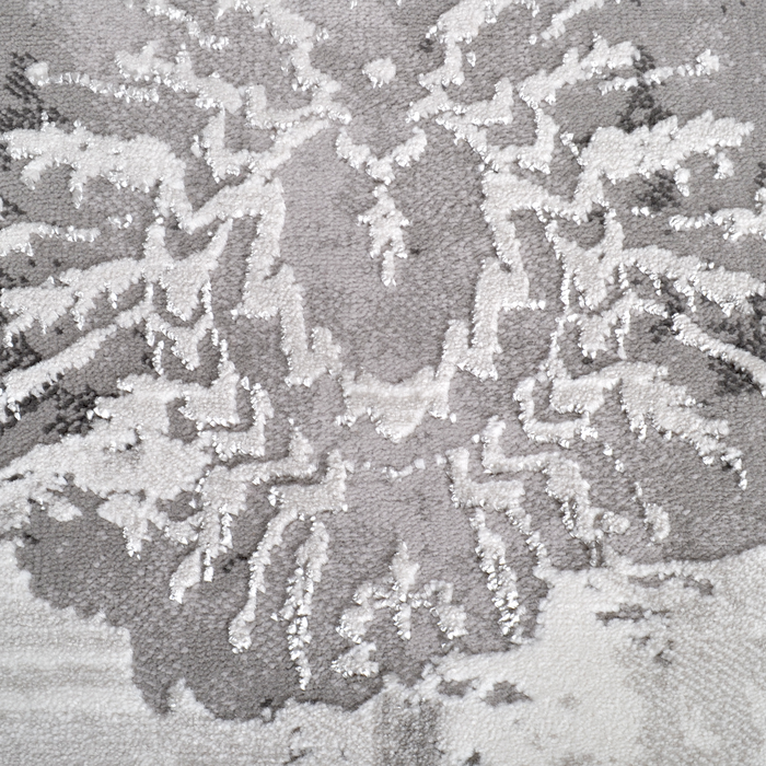 Detail of a CamRugs grey traditional area rug.