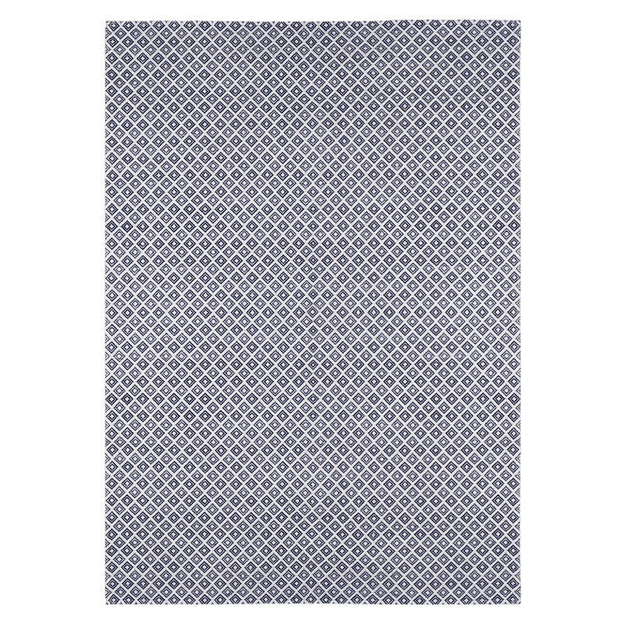 A blue flat weave area rug with geometric diamond designs.