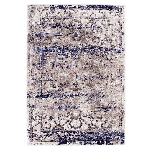 A purple and beige textured area rug with distressed traditional floral motif designs.