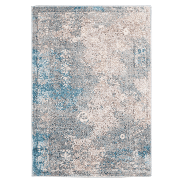 A blue and pink textured area rug with distressed traditional floral motif designs.