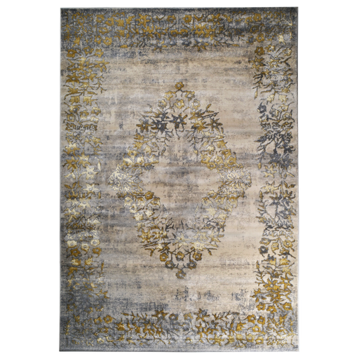 A beige area rug with distressed traditional floral motifs.